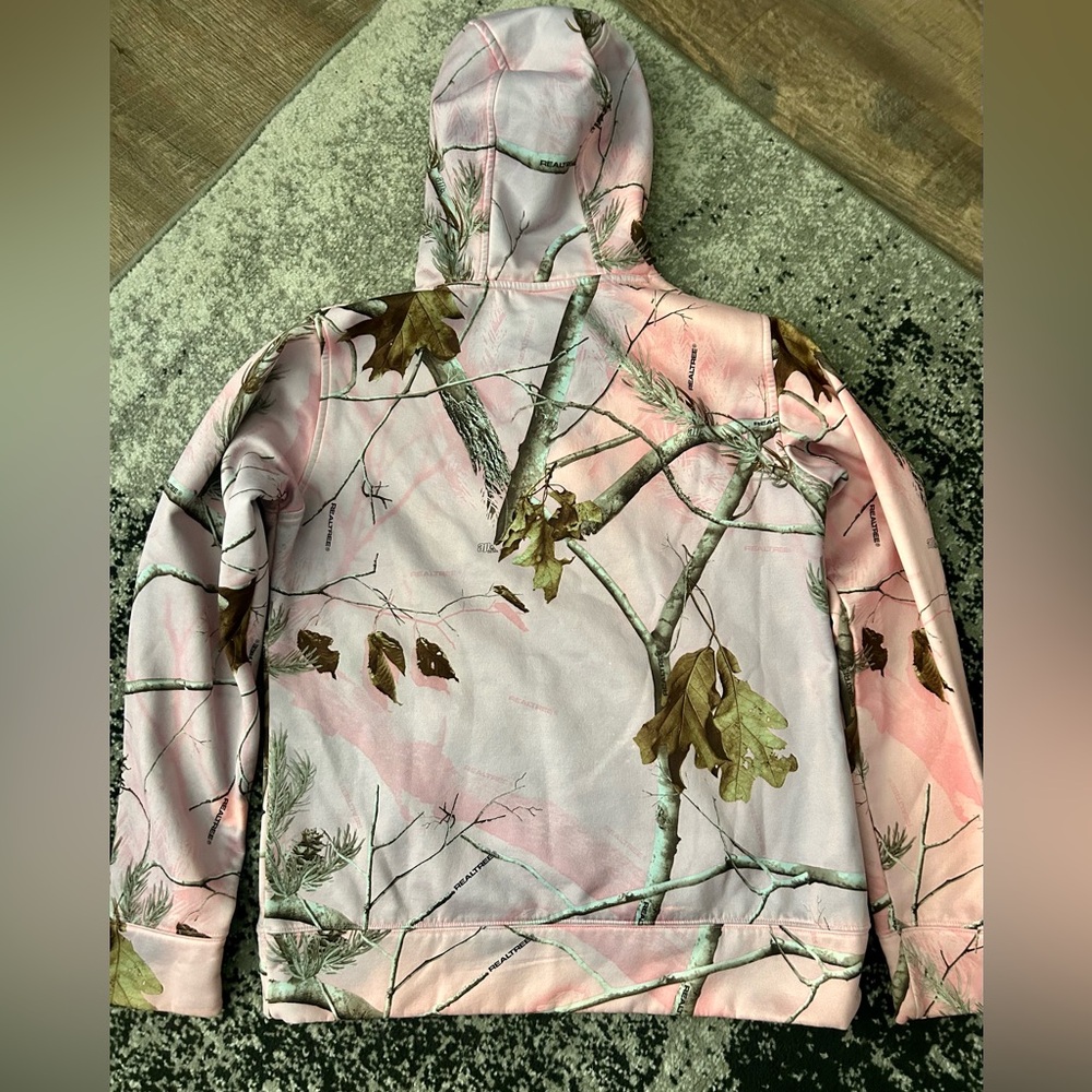 Under Armour Women's Pullover Hoodie in a pink Realtree camouflage pattern. - Picture 3 of 7